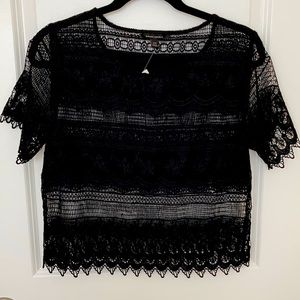Unique lace and embroidery black top